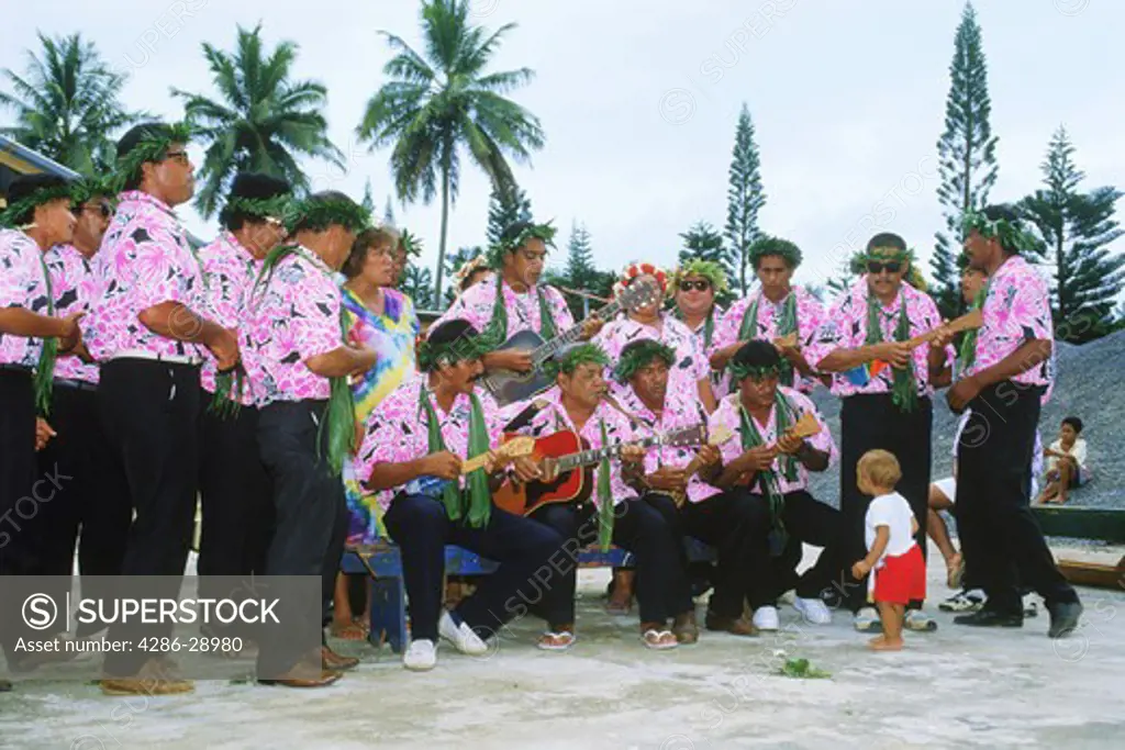 Polynesians playing local native music on Aitutaki in Cook Islands