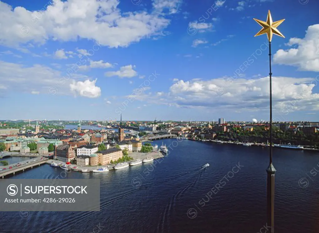 Overview of  Stockholm from Town Hall tower with golden star