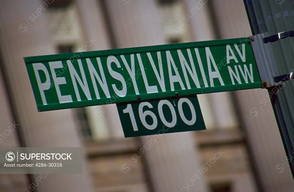 Close-up of a street sign indicating the 1600 (sixteen hundred) block of Pennsylvania Avenue in Washington, District of Columbia.
