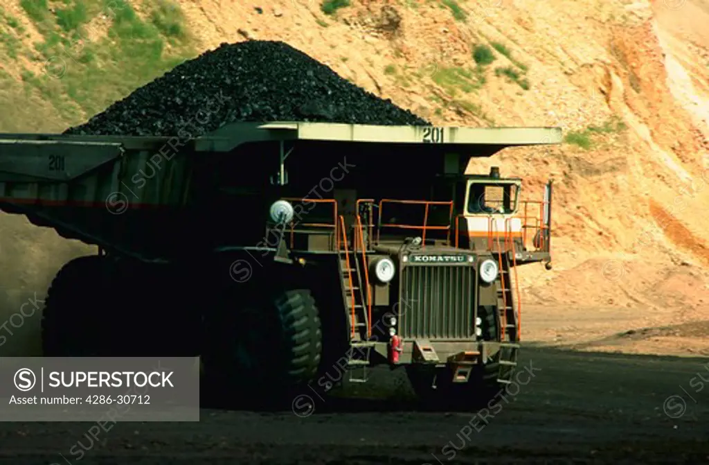 Haul truck bringing coal to crushing facility at western surface coal mine.