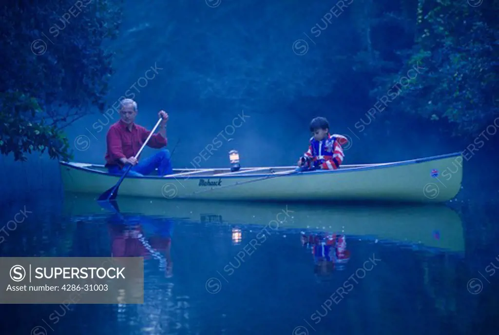 Boy and grandfather fishing in the early morning, MR