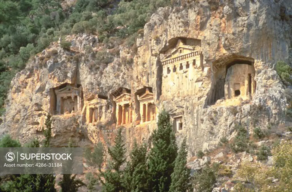Ancient tombs built into the mountainside on Turkeys southern Mediterranean coast near Dalyan.