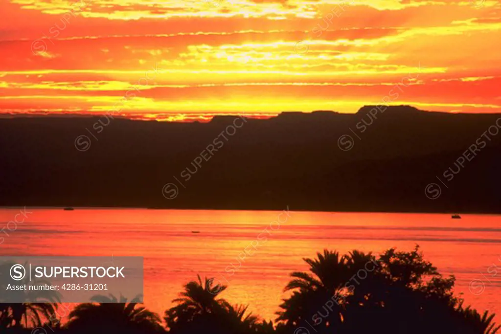 View of an orange sunset over the Red Sea. Aqaba, Jordan.