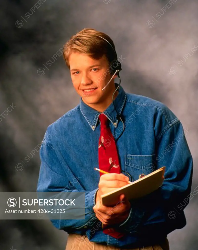 Young businessman with headset