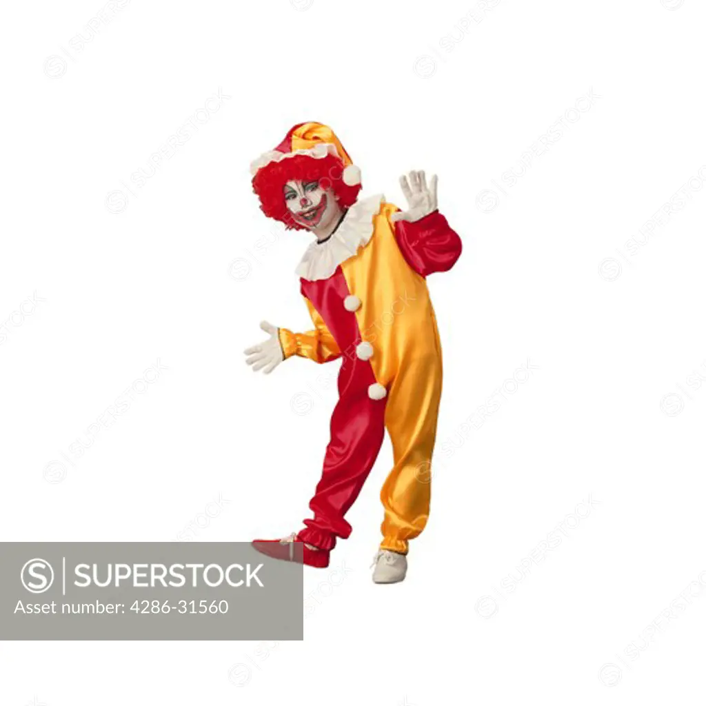 Seamless studio shot of a youngster wearing traditional clown makeup and a red and gold costume.