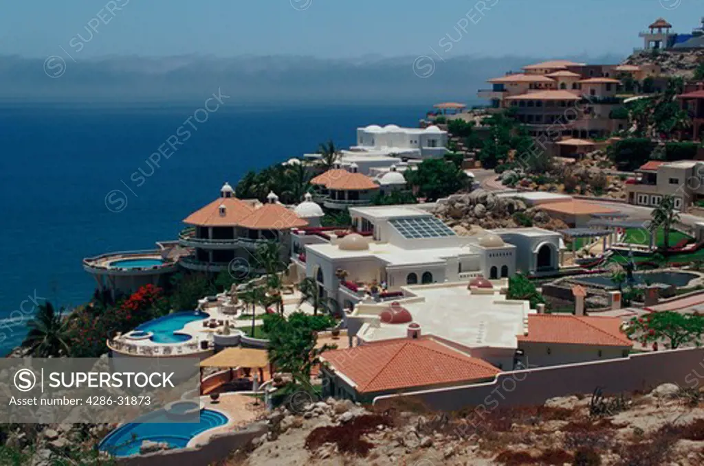 View from above of several expensive houses in Cabo San Lucas, Mexico. 