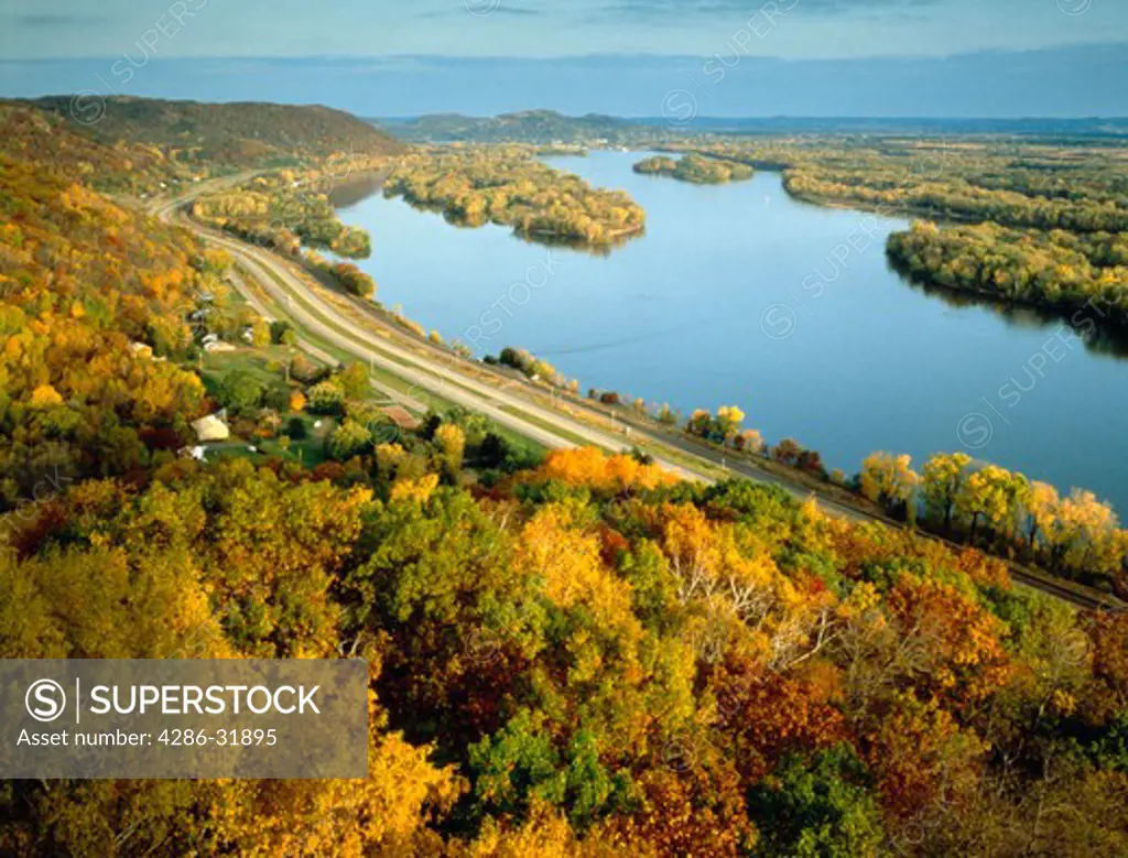 Aerial view of Great River Road along the Mississippi River with fall foliage.  View from Great River Bluffs State Park overview.