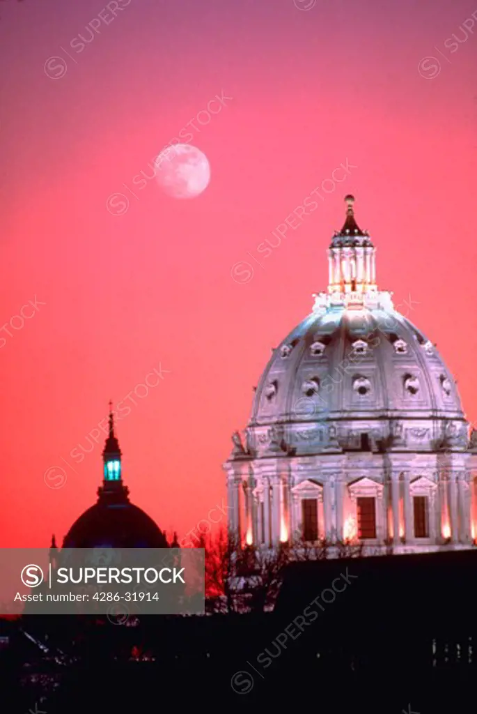 Moon over St. Paul Cathedral and State Capitol Building, St. Paul, Minnesota.