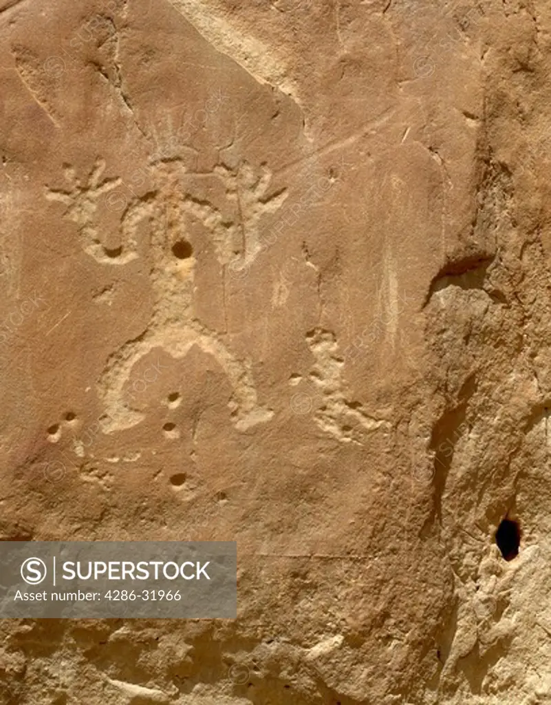 Chaco Canyon, New Mexico. Chaco Culture National Historic Park. Petroglyphs seen on the trail between Pueblo Bonito and Chetro Ketl ruins.  Ruins of dwellings of Ancient Puebloan peoples. Commerce center and spiritual meeting place.