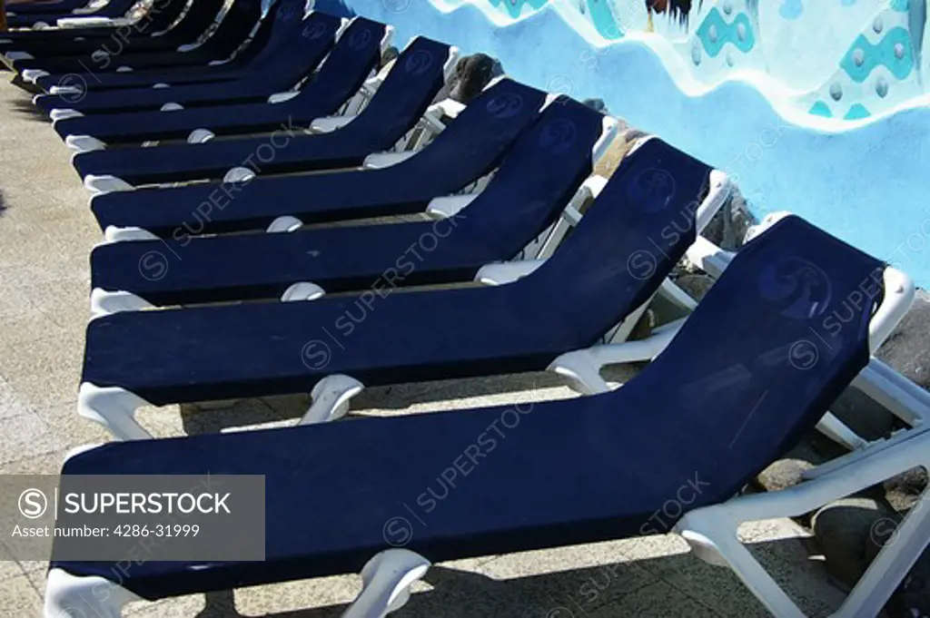 Deck chairs at at a hotel pool, Puerto Vallarta, Mexico