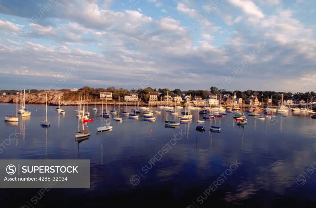 Boats docked at sunset in Rockport Harbor, Cape Anne, Massachusetts.
