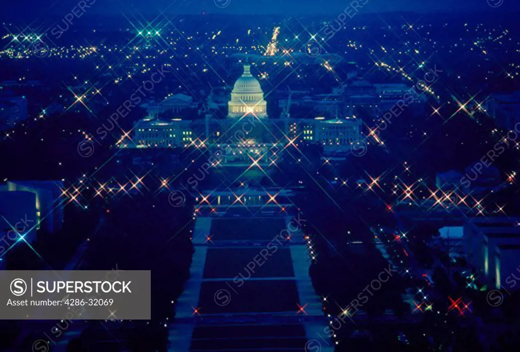 The U.S. Capitol and National Mall at night as seen from the top of the Washington Monument.