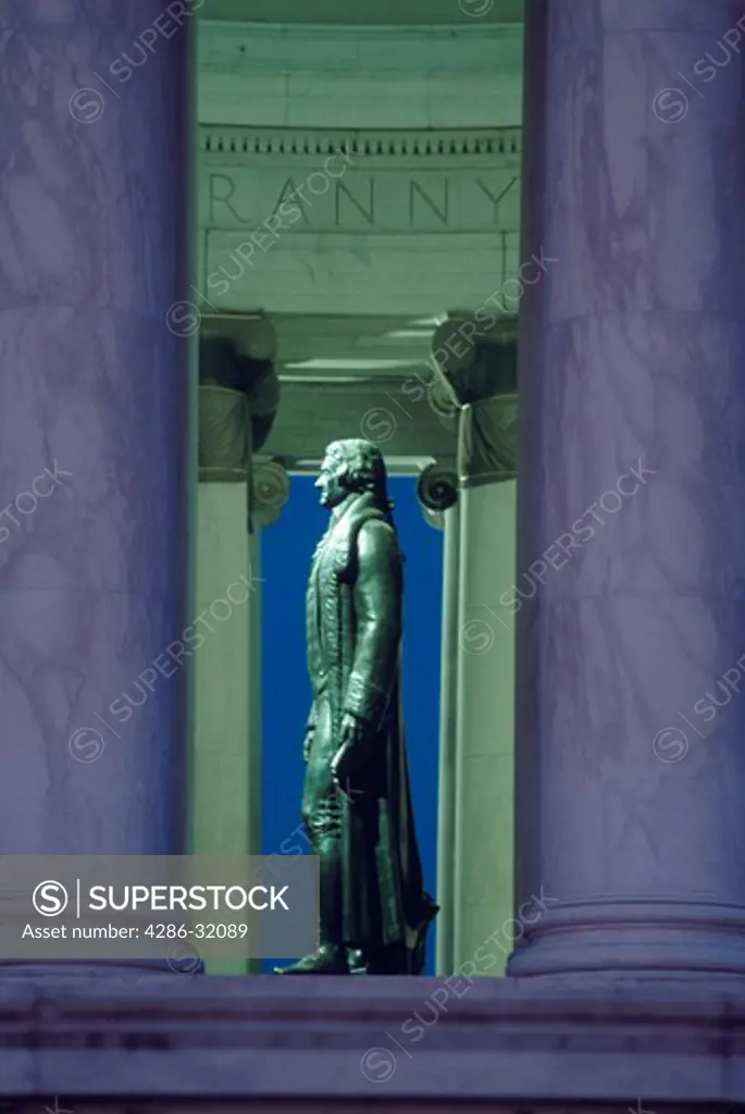 Bronze statue of Thomas Jefferson seen in profile in the rotunda of the Jefferson Memorial, Washington, DC.