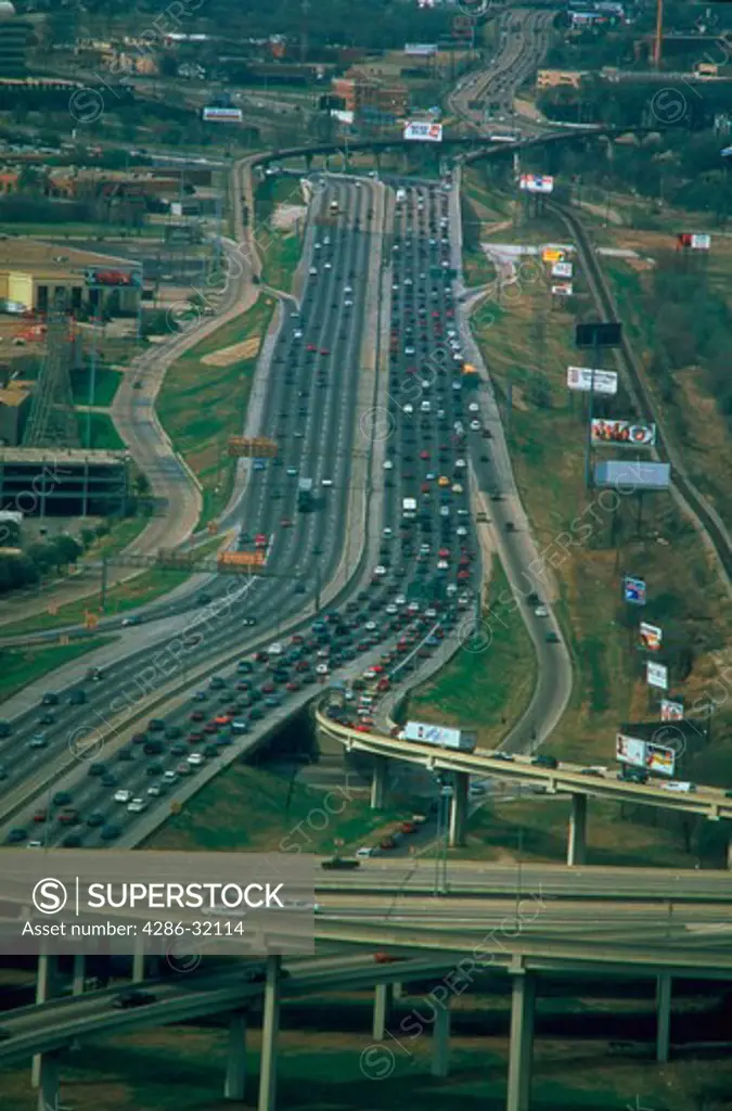 Aerial view of vehicles in traffic on the Stemmons Freeway in Dallas, Texas.