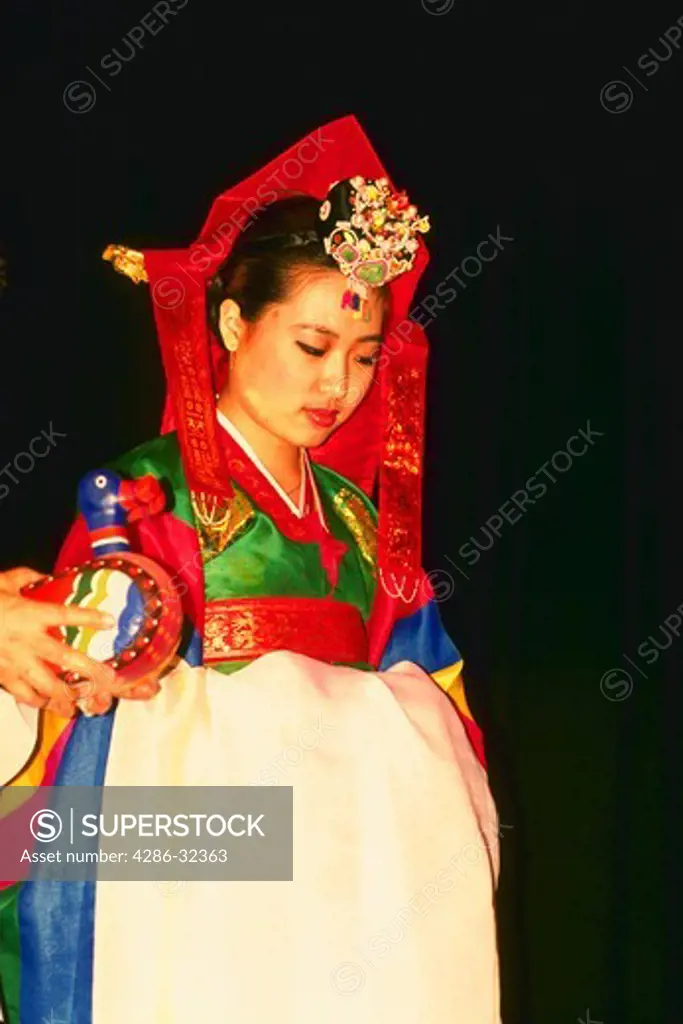 Korean woman in traditional costume.