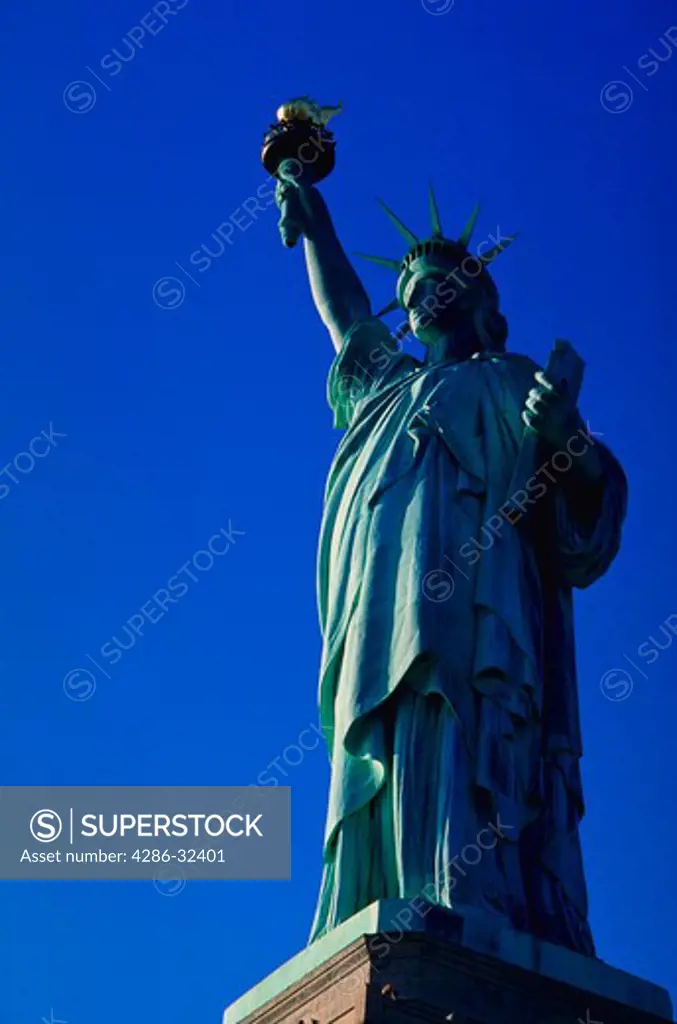 Portrait of The Staute of Liberty taken from the base of the statue looking upward.