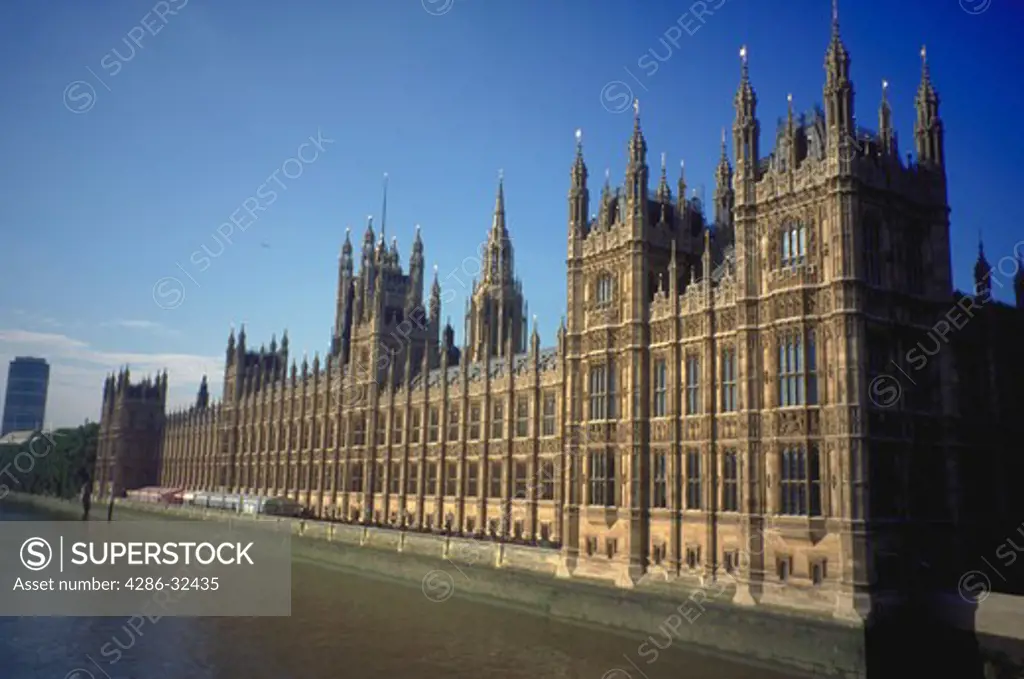 Side view of the Parliament building from Westminster Bridge in London, England.