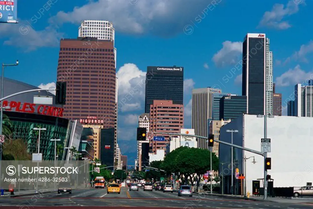 Downtown LA skyline and street scene, including the Staples Center, corner of Pico and Figueroa, Los Angeles, CA. 