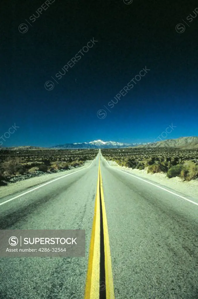 Road into horizon, near Palm Springs, California.