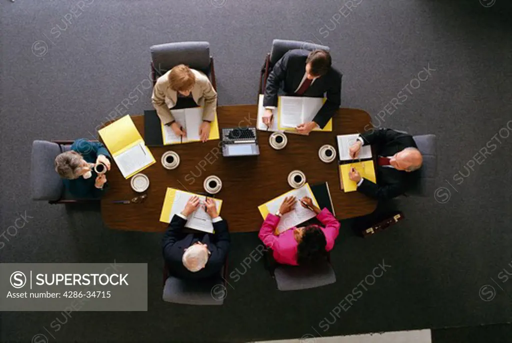 Overhead view of executives in a meeting