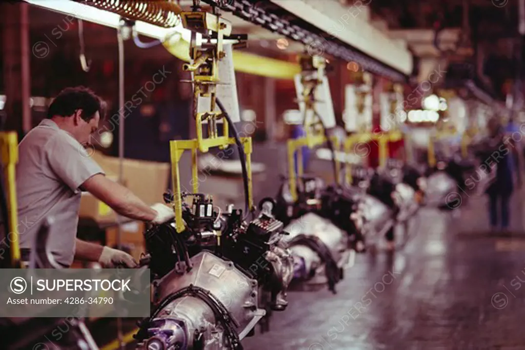 Workers assemble engines at General Motors plant in Baltimore, Maryland.