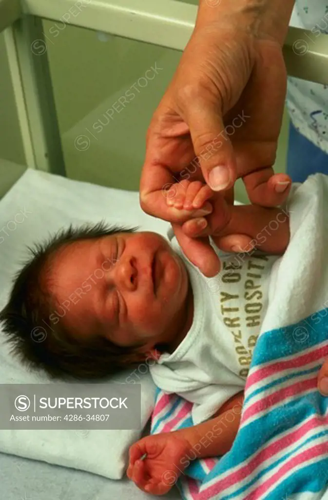 Premature baby in nursery at Flagler Hospital, St. Augustine, Florida.  (model released)