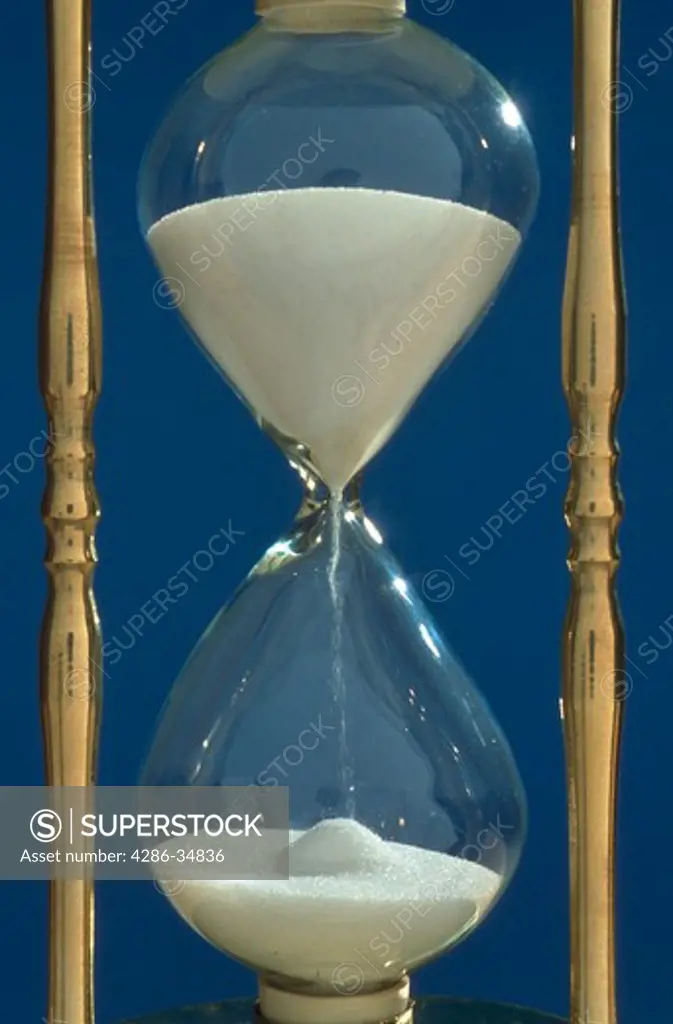 Hourglass.  The sands of time.  Put any subject inside the hourglass to indicate time pressure.  If you have a concept talk to us and we can execute it for you.