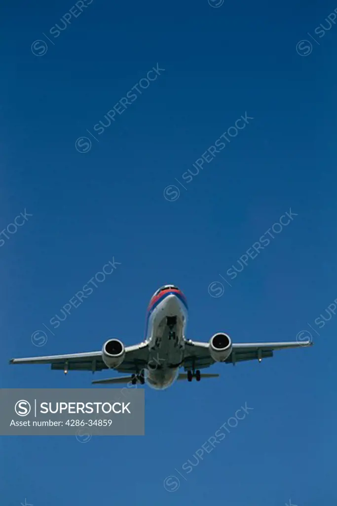 Airplane landing at LAX International Airport, California.
