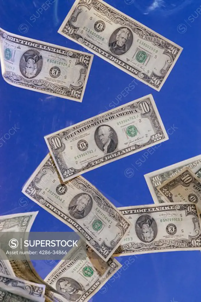 U.S. currency floating in space.