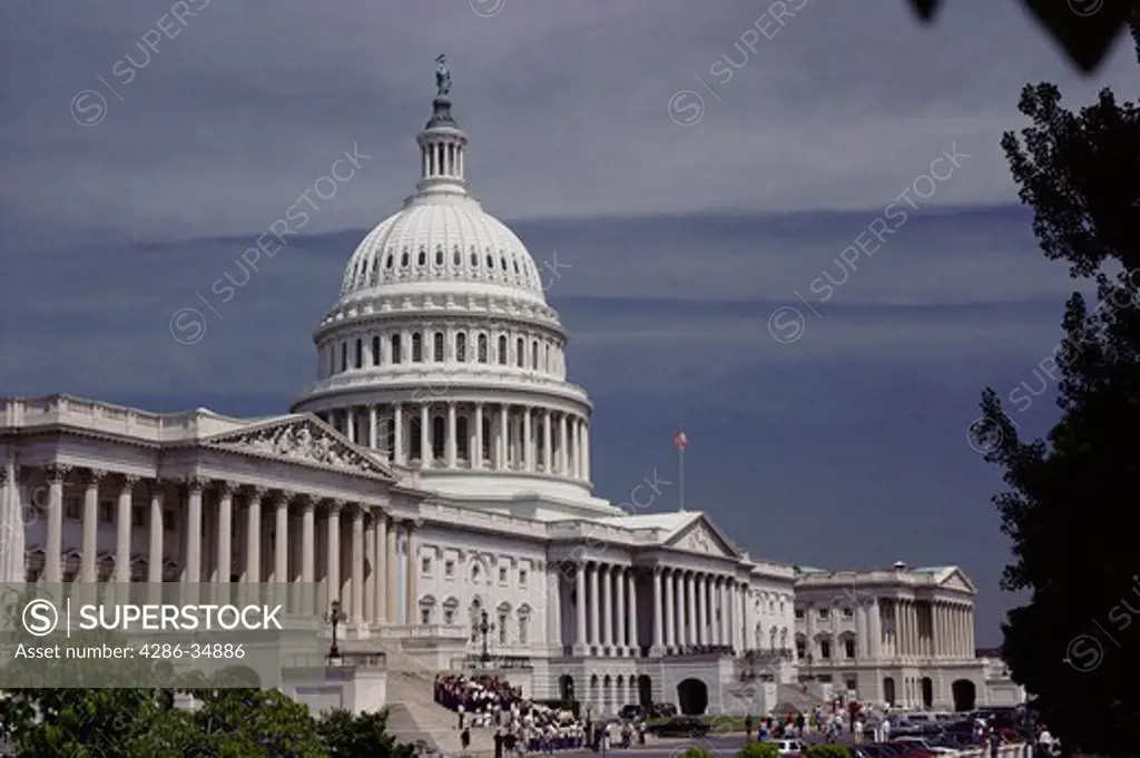 U.S. Capitol with House of Representatives in the foreground.  We have a wide variety of pictures of the Capitol and the Capitol Dome from various angles and in different light.