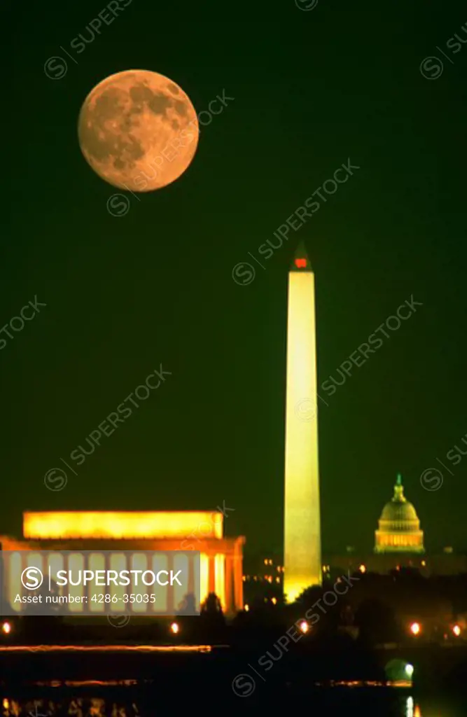 Moonrise over the Washington, DC skyline showing the Lincoln Memorial, Washington Monument and the U.S. Capitol. - DA37240