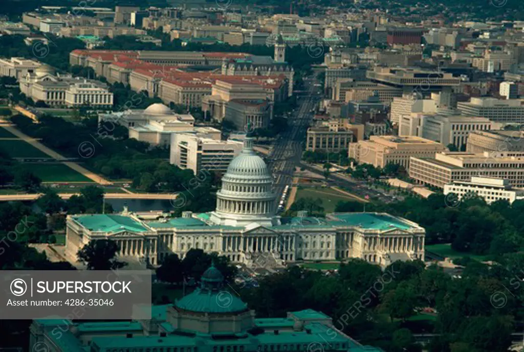 Aerial View of the U.S. Capitol and Pennsylvania Avenue behind it looking at the business district of Washington, DC.- ED58680