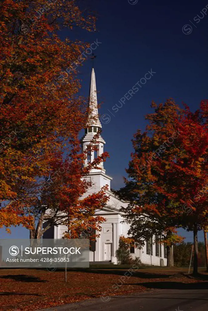 Church with fall foliage in Lunenburg, Vermont. - AB35492