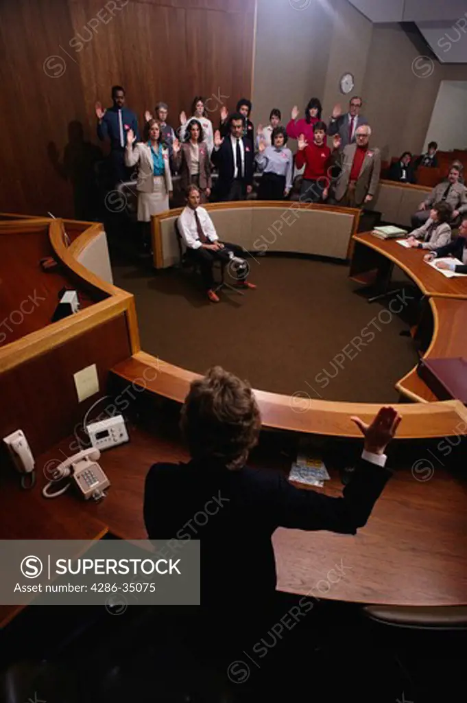 Jury being sworn in mock trial in Rockville, Maryland courtroom (all released). - AB73913