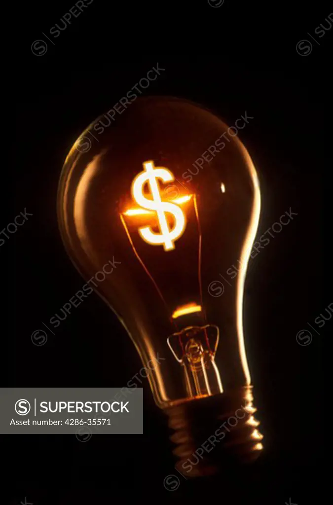 A clear light bulb with an illuminated filament in the shape of a dollar sign ($).