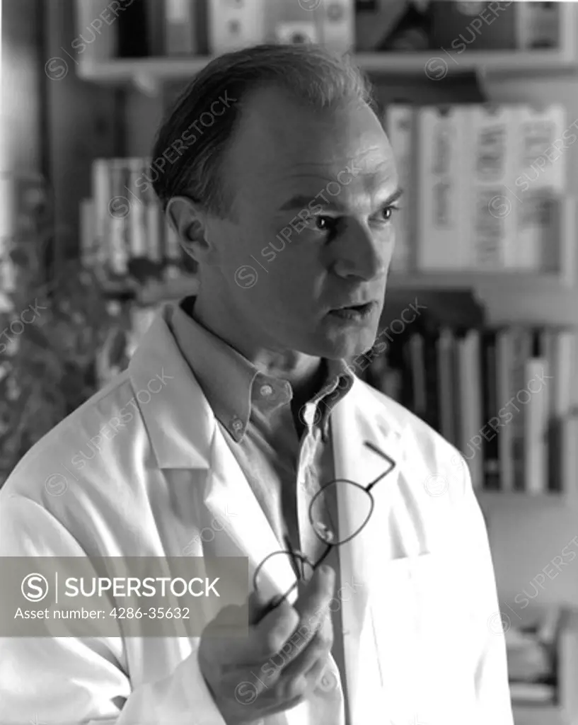 Male doctor in lab coat, MR