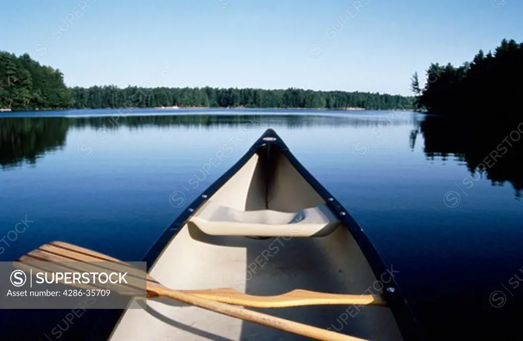 Canoe at rest on Sabbathday, Maine. 