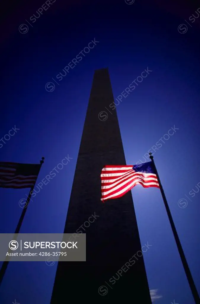 Washington monument, with highlighted American flag.  Many other Washington images available. (Concept. U.S.A. Travel.)