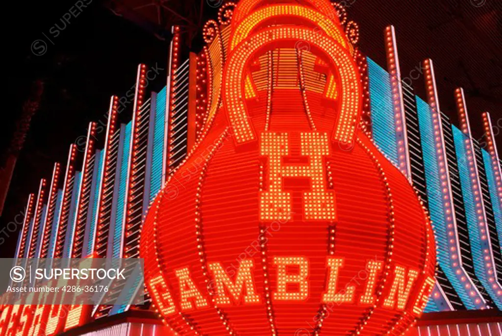 Gambling sign in neon lights outside the Horseshoe Hotel and Casino, Las Vegas, Nevada. 