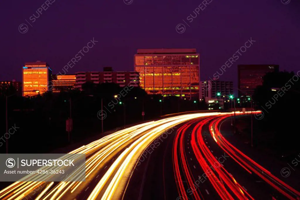 Time-exposure of automobile traffic on Interstate 25 at Franklin Street in Denver, Colorado at night.
