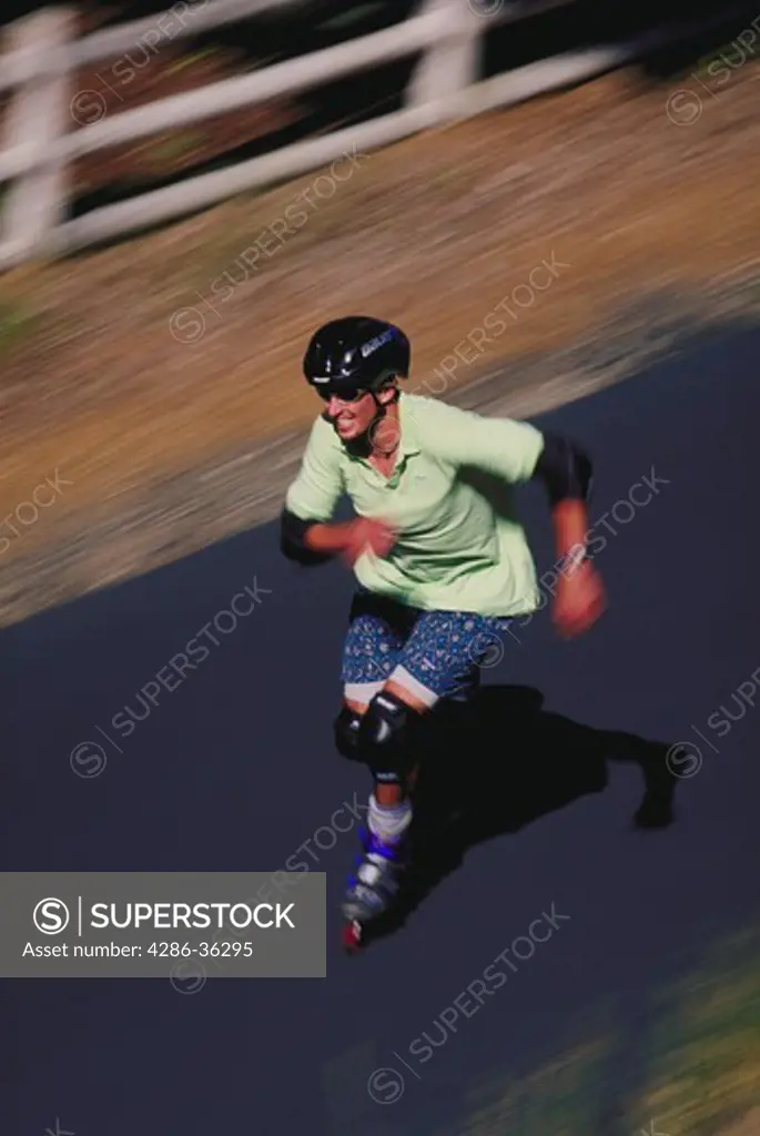 Man rollerblading, blurred