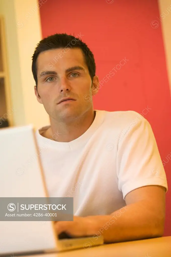 Man working on laptop  MR-0406 PR-0407