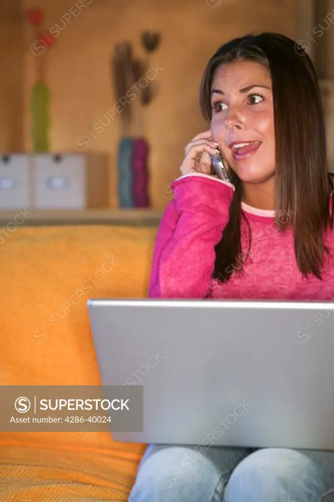 Young woman with cellphone and laptop  MR-0429 PR-0419