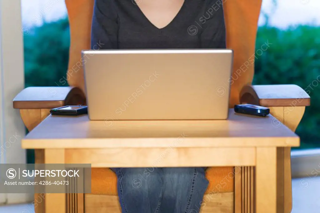 Woman using a laptop computer.  MR-0512 PR-0505