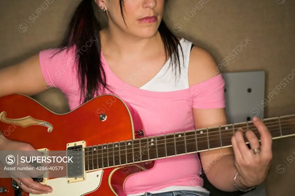 Woman and guitar.  MR-0535 PR-0536