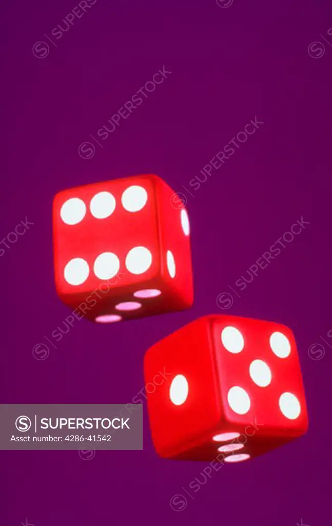Pair of red dice.  KEYWORDS: GAMBLING, RISK, CHANCE, GAME, BETTING, SPECULATE.