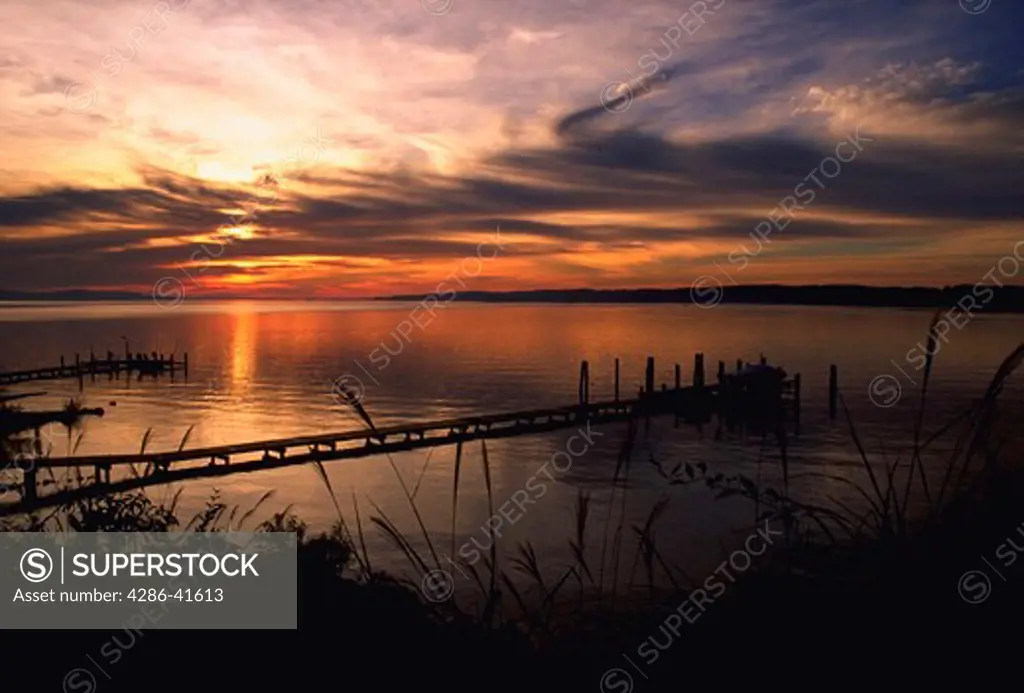 Silhouette of pier on Magothy River at sunset, Pasadena, Maryland.