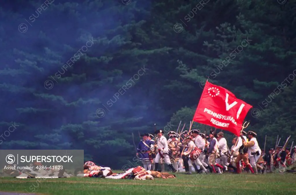 VI Pennsylvania Regiment duing reenactment of battle during Revolutionary War.