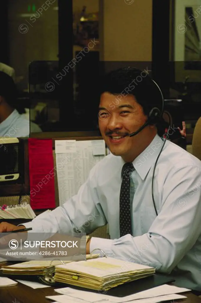 asian male stock broker, San Francisco, CA