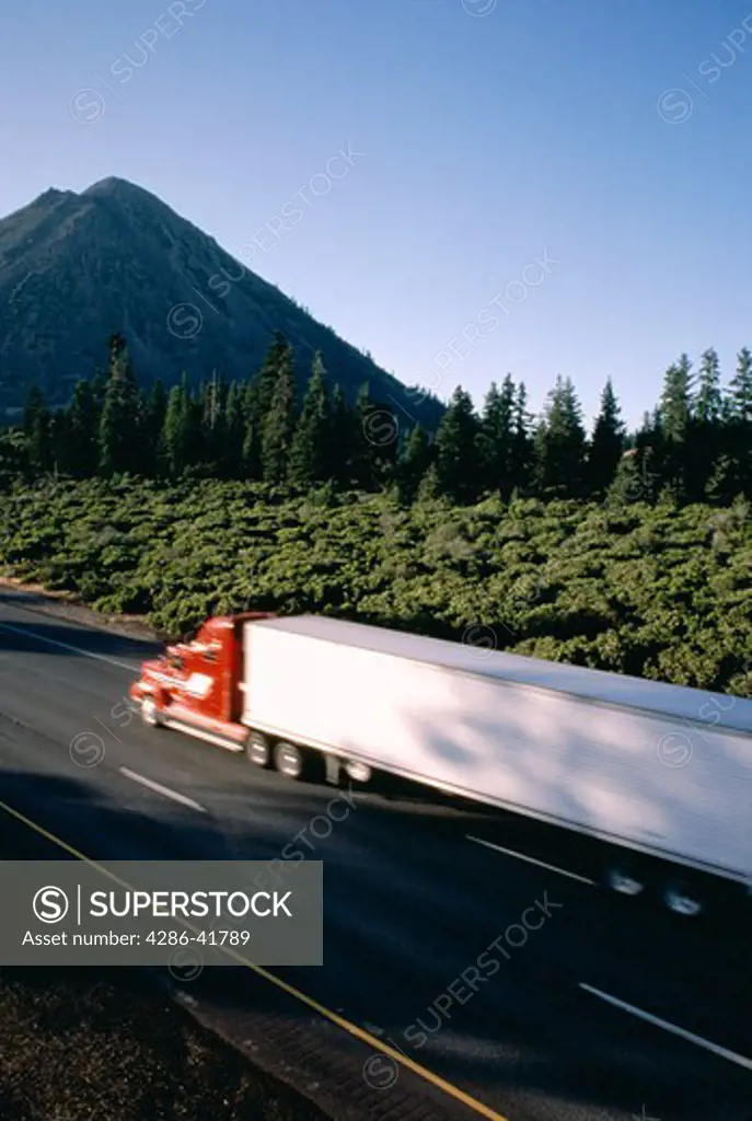 Blurred truck on highway